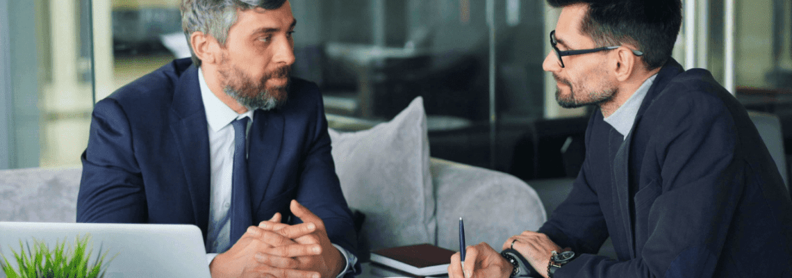 Two business professionals having a discussion. Business Advice. Contract Review Lawyer. Management Consulting Industry